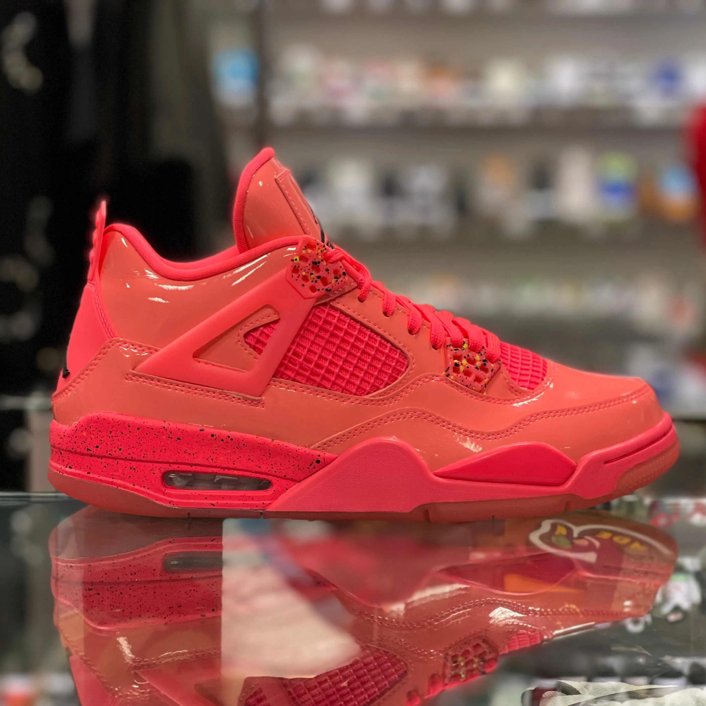 Air Jordan 4 Retro "Hot Punch”
