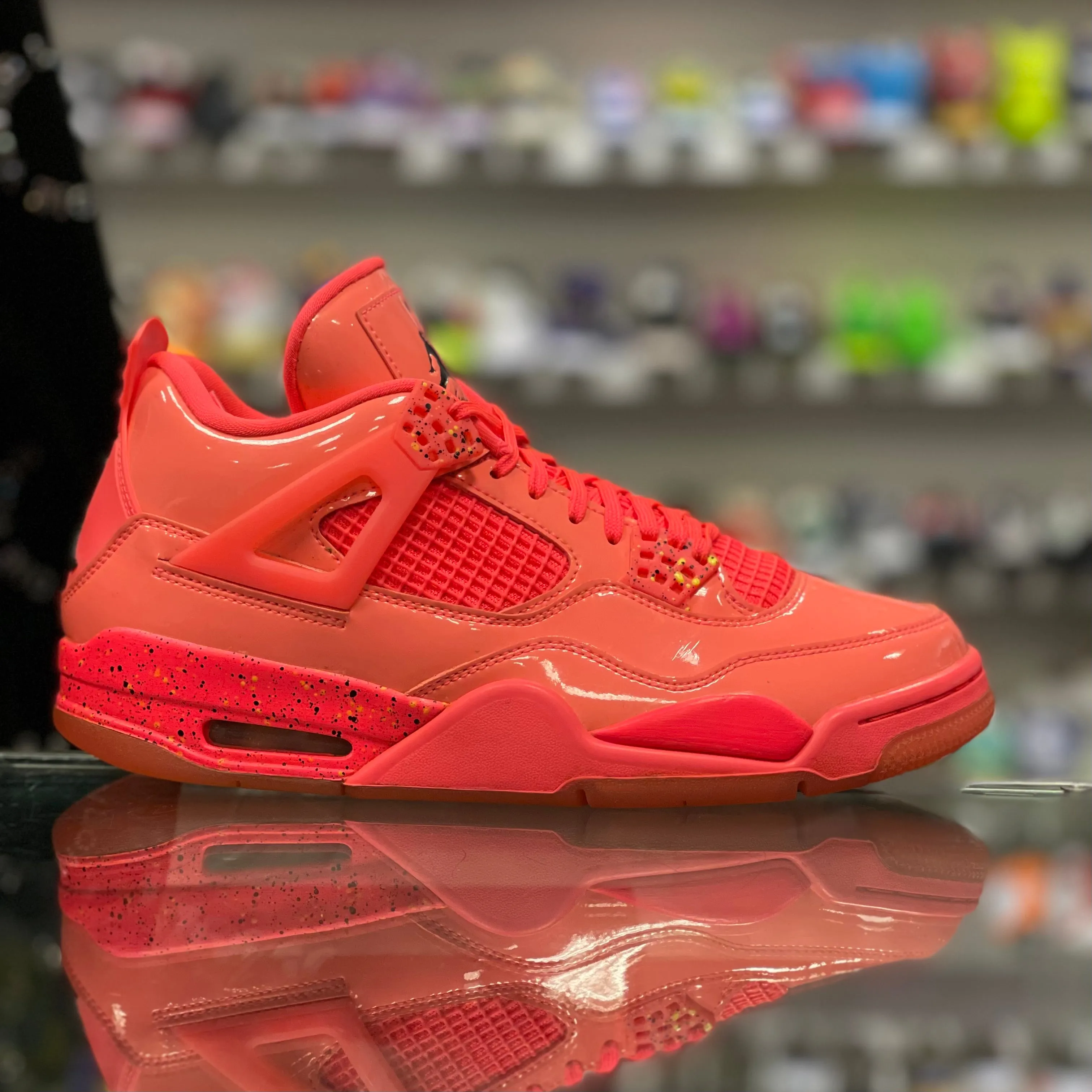 Air Jordan 4 Retro "Hot Punch”