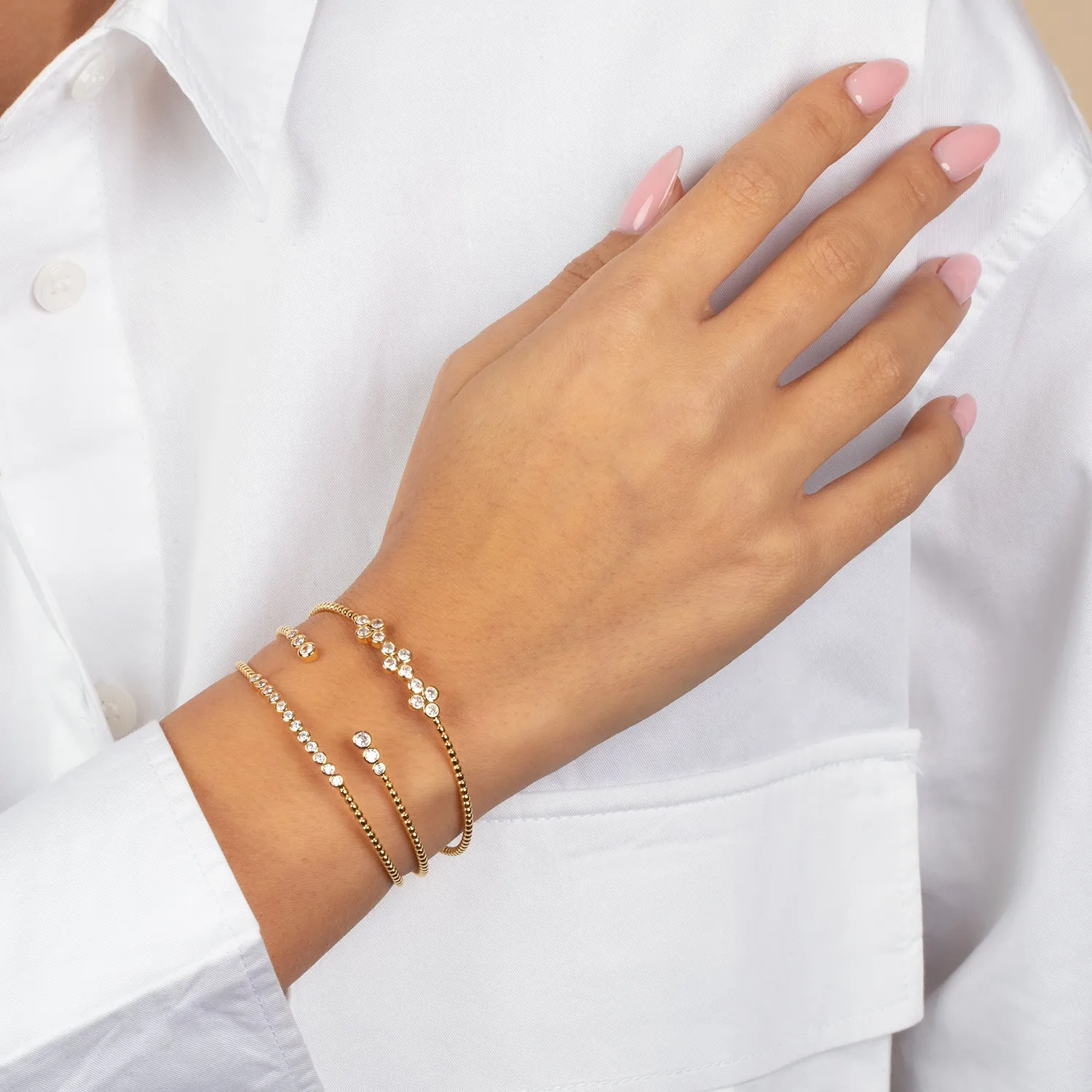 Graduated CZ Bezel Open Claw Bangle Bracelet