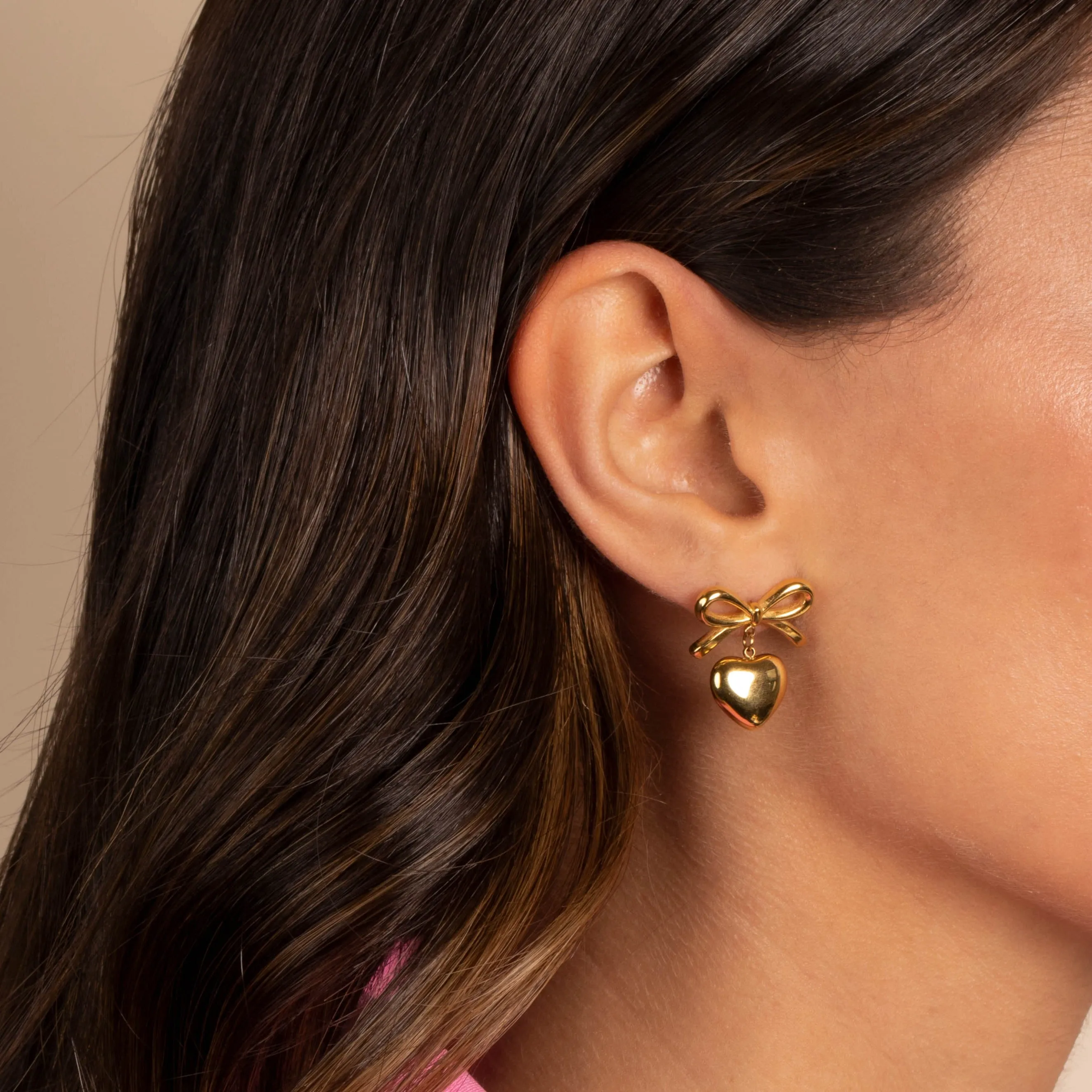 Solid Bow Tie Dangling Heart Stud Earring